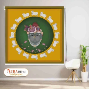This Shrinathji and Cows Pichwai Art Roller Blind for Pooja Room and Mandir featuring traditional Indian Pichwai art: a grey-faced Shrinathji (Lord Krishna) adorned with jewels and turban, centered in an olive-green circle surrounded by a garland of white cows and pink lotus flowers, all on a mustard yellow background.